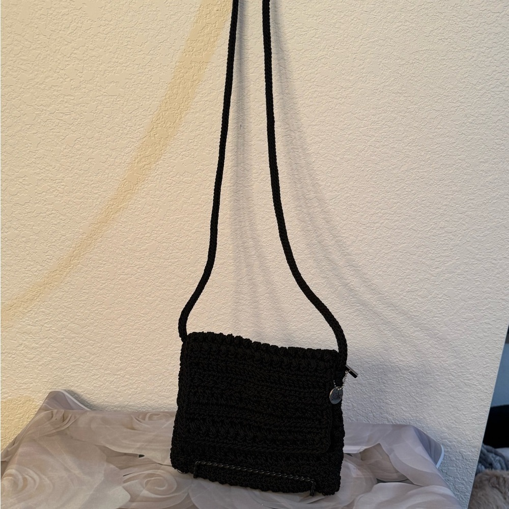 - The Sak Women's Black Crochet Crossbody Bag with Zip Closure